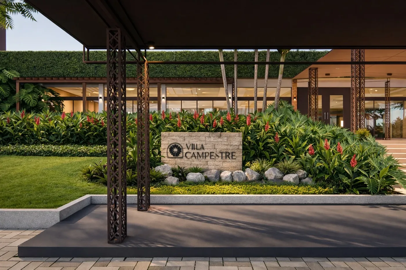 Fachada do Vila Campestre com jardim e iluminação noturna